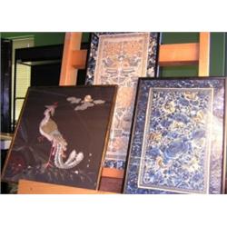 Three Chinese silkwork panels, to include: a pair of sleeve panels worked with red peonies, 60 x 29.