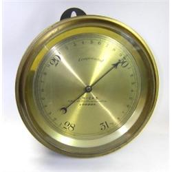 'J Hicks, 8, 9 & 10 Hatton Garden', a compensated aneroid barometer, the brass dial and bezel in cy.