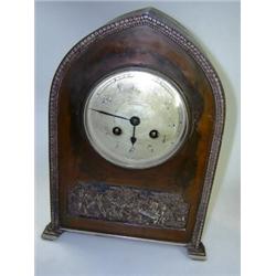 'Samuel Marti', an early 20th century copper and electroplate mantel clock retailed by Bassett & Co.