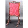 Image 1 : A William IV rosewood framed fire screen, the silk work panel within an acanthus and scroll carved..