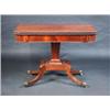 Image 1 : A Regency mahogany pedestal tea table, the rounded rectangular fold over top with gadrooned edge ab.