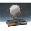 Image 1 : A William IV mahogany framed dressing mirror, the circular plate supported on scrolling uprights ab.