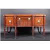 Image 1 : A Regency mahogany sideboard stamped Gillow, the satinwood banded moulded shaped top above a frieze.