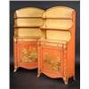 Image 1 : A pair of Regency style chinoiserie decorated bookcases, each with arched back above open shelves,..