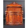 Image 1 : A William IV mahogany serpentine chiffonier, the scroll carved back incorporating a shaped shelf on.