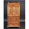 Image 1 : A 19th century Cyontinental walnut cabinet, the moulded rectangular top with pierced three quarter..