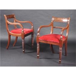 A set of seven 19th century mahogany dining chairs, including two carvers, and a single matched car.