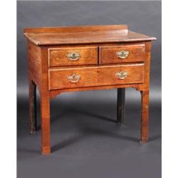 An 18th century walnut low boy, the rectangular crossbanded top above two short and one long banded.