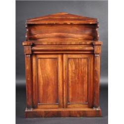 A William IV rosewood inverted breakfront chiffonier, the arched back incorporating a shelf on scro.