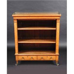 A William IV satinwood floor standing open bookcase, the rectangular top with pierced brass three q.