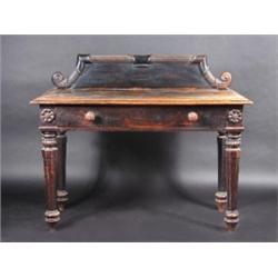 A Victorian oak serving table, the moulded rectangular top with arched reeded scrolling back above..