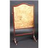 Image 1 : A 19th century mahogany framed fire screen, the adjustable screen incorporating a shelf, standing o.