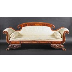 A William IV mahogany scroll end settee, the arched scrolling top rail above a padded back, scrolli.