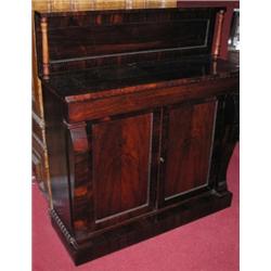 A Regency rosewood chiffonier, the rectangular top with solid panelled back above a beaded frieze a.