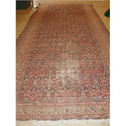 A Caucasian wool runner, the midnight blue field filled with repeating Herati motifs within geometr.