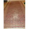 Image 1 : A Caucasian wool runner, the midnight blue field filled with repeating Herati motifs within geometr.