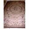 Image 1 : An Aubusson style needlepoint carpet, with all over scrolling floral design, 244 x 152cm   £300-500.