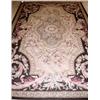 Image 1 : An Aubusson style needlepoint carpet, with all over scrolling floral design, 244 x 152cm   £300-500.