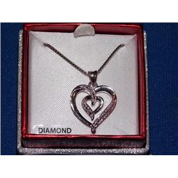NECKLACE - 2 ROUND FACETED WHITE DIAMONDS IN STERLING SILVER HEART DESIGNED SETTING - RETAIL ESTIMAT