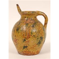 An Early 19th Century Donyatt Puzzle Jug, decorated tulips, roses and a bird in a tree, inscribed mo