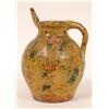 Image 1 : An Early 19th Century Donyatt Puzzle Jug, decorated tulips, roses and a bird in a tree, inscribed mo