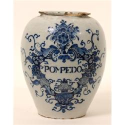 An Late 18th/Early 19th Century Delft Drug Jar, decorated underglaze blue POMPEDOER" within a foliat