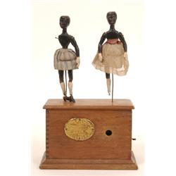 A 19th/20th Century Clockwork Automaton, dancing black women, Millikin & Lawey, The Strand, London,