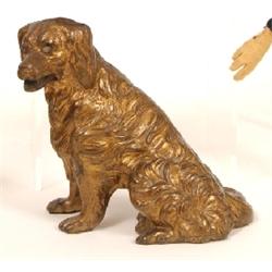 A Gilt Metal Letter Holder, in the form of a dog, with glass eyes (one eye missing) 10 cm