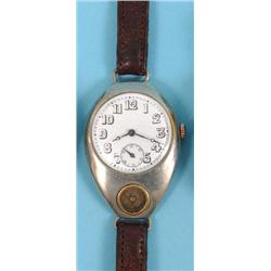 A WWI Officers Watch, with enamel dial, Arabic numerals and subsidiary seconds dial, with inset comp