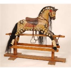 A 20th Century Carved and Painted Rocking Horse, 127 cm See illustration