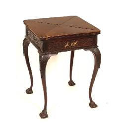 A Late Victorian Mahogany Envelope Card Table, with blind fretwork frieze on acanthus capped cabriol