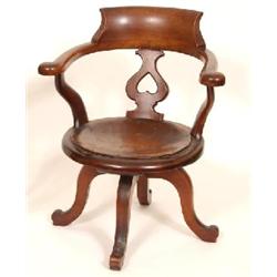 A Late 19th Century Mahogany Office Chair, with pierced back splat