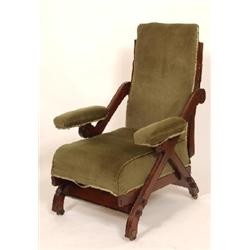 A James Shoolbred Walnut Gothic Style Reclining Armchair See illustration
