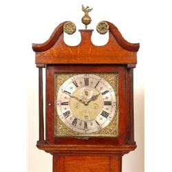 A Longcase Clock, the 30 cm dial with Roman numerals, subsidiary seconds dial and calendar aperture,
