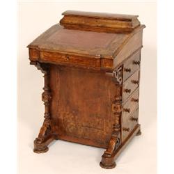 A Victorian Walnut Davenport, with fitted interior, four short drawers and four false drawers, 52 cm