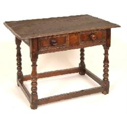 An 18th Century Oak Side Table, with single frieze drawer, on bobbin turned legs joined by stretcher