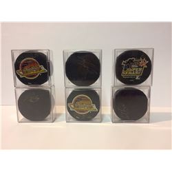 SIGNED HOCKEY PUCKS LOT