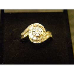 LADIES 1OK WHITE AND YELLOW GOLD RING CONSISTING OF 58 DAIMONDS. iNSURANCE REPLACEMENT $4200