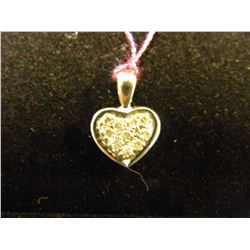 LADIES 1OK WHITE GOLD PENDANT W/ 10 DIAMONDS. INSURANCE REPLACEMENT VALUE $420