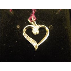 LADIES 10K WHITE GOLD PENDANT W/ EIGHT DIAMONDS. INSURANCE REPLACEMENT VALUE $490