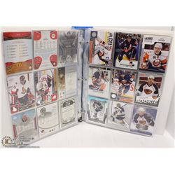 BLUE & WHITE BINDER W/OVER 320