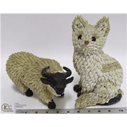 A PAIR OF HANDMADE FIGURINES MADE FROM SHELLS