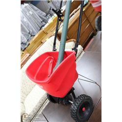 EARTHWAY FERTILIZER SPREADER AND WEEDEATER TRIMMER