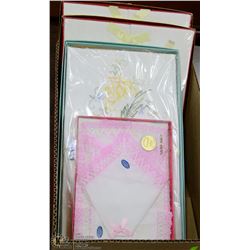 ESTATE BOX OF NEW PILLOWCASES AND HANKERCHIEFS