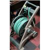Image 1 : ROLL UP GARDEN HOSE W/ CART