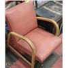 Image 1 : VINTAGE SALMON LEATHER CHAIR WITH WOOD FRAME
