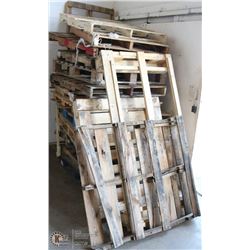 LARGE STACK OF WOOD PALLETS