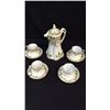 Image 1 : Hand Painted Nippon Tea Set Tea pot, four cups and saucers with each cup.  Small hairline crack in o