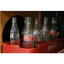 TWO TRAYS OF COCA COLA BOTTLES