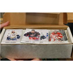 BOX OF HOCKEY CARDS AND BOX OF HCOKEY BOOKS AND PENNANTS